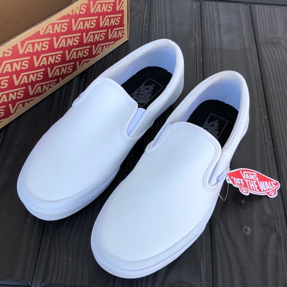 tumble slip on vans white